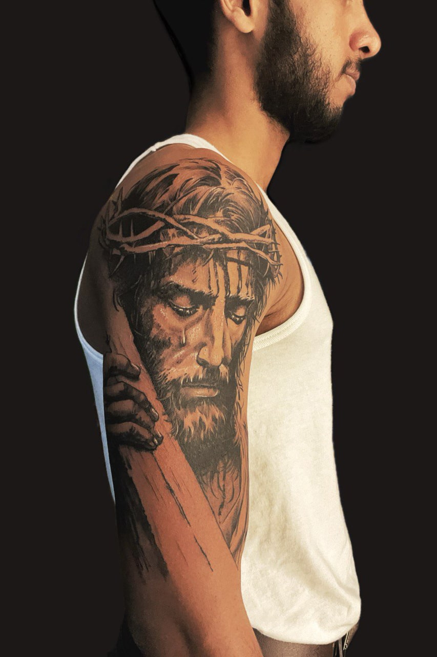 Jesus tattoo inked